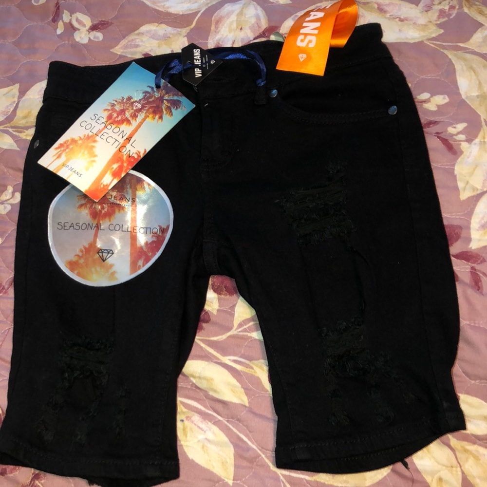 Black ripped shorts